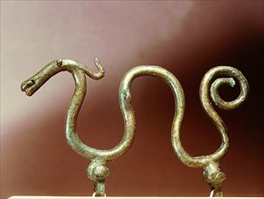 Bronze ornament in the shape of a serpent