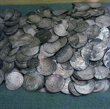 Coins, mainly Byzantine and Islamic   part of Viking treasure found in burials which illustrate theextent of Viking travels