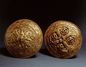 Pair of gold brooches