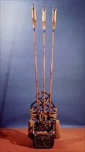 Arrows mounted on an ornamental stand