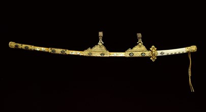 The court sword Kazadachi, made in deliberate imitation of a sword of the Heian era, with elaborate enamel and gilt work