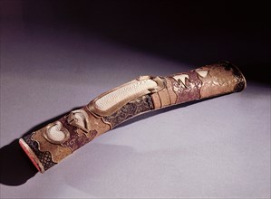 Sword hilt partly covered with same