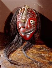 A mask used as a powerful element in ceremonies of the False Face medicine society to help appease spirits