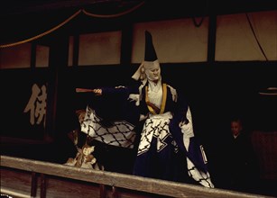 A scene from a Kyogen play, a light form of drama associated with Noh