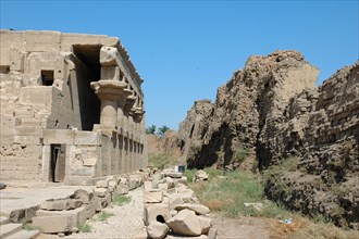 The Roman Bath House fronted by the inner face of the mud-brick wall surrounding the Hathor Temple complex