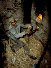 Blacksmith at his forge