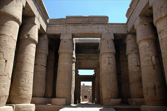 Interior view of the colonnaded court of the 9th Pylon, built by the pharaoh Horemheb, within which are blocks of masonry recycled from the Temple of Aten which he demolished