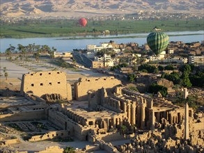 Aerial view of Karnak, the river Nile and the west bank Theban Necropolis containing the Valley of the Kings and the Valley of the Kings in the distance