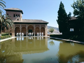 The pool of the Partal and the Torre de las Damas in the Alhambra Palace, Granada   Spain