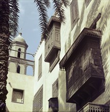 View of Cairo houses with masharabiyya (screen or grille of tined wood)