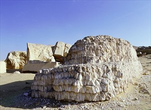 An eroded alabaster block in the middle of what used to be the pillared court of the eastern part of Teti's cult temple at Saqqara
