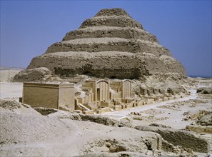 The step pyramid of Zoser at Saqqara and the enclosure with stone replicas of kiosks and chapels for the royal jubilee festivals ( heb-sed )
