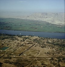 Aerial view of the Temple of Amun, with the Temple of Montu and the modern village of Karnak at its right