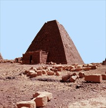 The pyramids of the Meroitic kings and queens in the north cemetery Meroe built on a ridge overlooking the ruined city