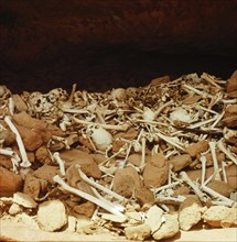 The interior of a burial cave used by the Tellem in the sheer face of the Bandiagara cliffs near Sanga