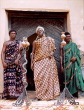 Nana Amonu X, Omanhene of Anomabuand two members of his court with their insignia of office