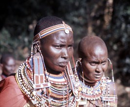 The elaborate beadwork of these Masai women indicate their family and ethnic identity, social status,and the number and status of their children