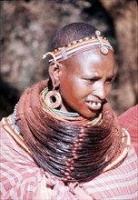 The elaborate beadwork of this Masai woman indicates her ethnic identity, social status, and the number and status of her children