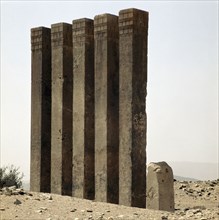 Five pillars still standing on the site of the Baran Temple, near the ancient city of Marib