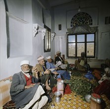 House interior, men chewing qat leaves