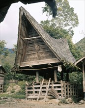 Similar in design to the houses, Toba granaries have a large space within the roof to store the harvest, while the open area beneath is a platform on which women gather to grind rice
