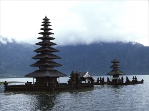 Pagoda roofed shrines at the PuraDanu Bratan recall the cosmic mountain Mount Meru a concept shared by both Hinduism and Buddhist cosmology particularly important on mountainous Bali