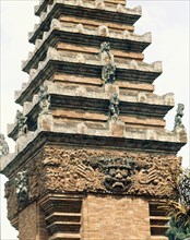 The tiered structure of Balinese Hindu shrines reproduces the three levels of the cosmos: the under-world, the world of humanity and the towering celestial mountain of the gods