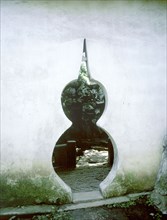 Gourd-shaped door, a Taoist symbol of the unity of Heaven and Earth, at the Changlang Ting (Surging Wave) Pavilion Garden