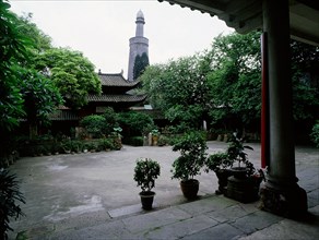 The courtyard and minaret of the Memorial Mosque to the Prophet, the Huai Sheng Si, more usually known as Beacon Tower Mosque, where the Islamic minaret rises above the roof-line of traditional Chines...
