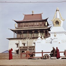 Mongolians praying at an open air shrine in the centre of Ulan Bator