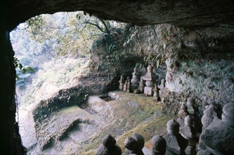 Yagura (burial cave used to deposit ashes) on the slope of Mount Kinubari
