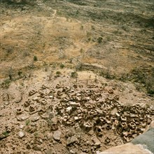 A Dogon village viewed from a cave in the Bandiagara cliffs