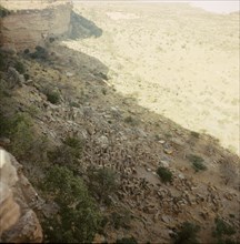 A Dogon village at the foot of the Bandiagara cliffs