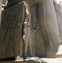 Base of a statue of Ramesses II in front of the temple at Luxor