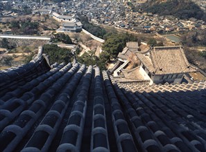 View from the keep of Himeji Castle with the houses of samurai and townspeople clustered together at its feet