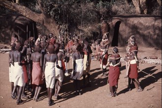 Young Masai in ceremonial dress