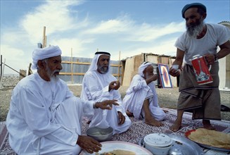 The 'urafaa', wise men who oversee the distribution of water at al-'Ain oasis