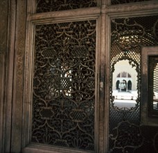 An intricately carved screen in the Red Fort, Delhi