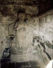 Statue in a niche from the complex of temples at Lara Jonggrang