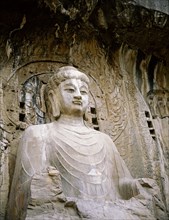 The colossal 17 metre high image of Vairocana Buddha in the Fengxian temple at the Longmen cave temples