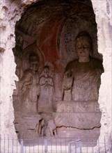 The Longmen cave-temple complex which extends for about 1000m along the Yi River
