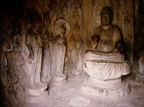 The Longmen cave-temple complex which extends for about 1000m along the Yi River
