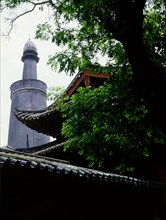The Memorial Mosque to the Prophet, the Huai Sheng Si, more usually known as Beacon Tower Mosque, where the Islamic minaret rises above the roofline of traditional Chinese architecture