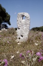 Megalithic standing stone at the village of Talati de Dalt