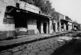 Shop entrances in one of the streets in Pompeii