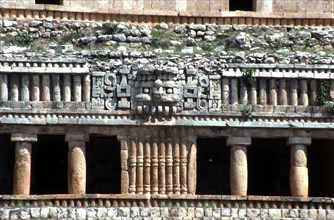Detail of the facade of the 'Palace of Sayil' from the south, with a Chac (rain god) face in the centre