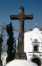 Church courtyard cross at San Matias