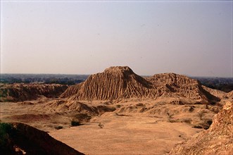View of major eroded mud-brick pyramid at Mochica site of Tucume