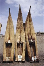 Three "caballitos", little horses, made of totora reed - an ancient Peruvian type of boat