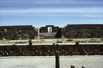 View across the "Semi-subterranean temple" to the monolithic doorway to the Kalasasaya enclosure, Tiahuanaco   Bolivia